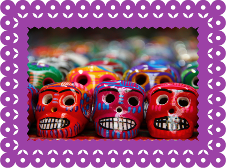 photo of colorful handpainted skulls sitting in rows together